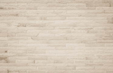 Cream and beige brown brick wall concrete or stone texture background backdrop.