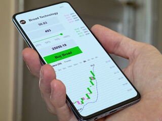 Exchange-traded fund etf chart, Stock market data on smartphone. Business analysis of blue chips. Invest in international ETF. Buying strategic broad ETF
