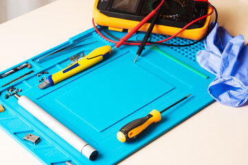 Flat lay image of dismantling the broken smart phone for preparing to repair or replace some...