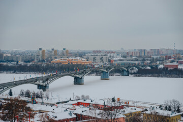 Kanavinsky Bridge in Nizhny Novgorod. Bridge across the Oka river. View of Nizhny Novgorod Fair and new residential areas 