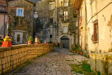 Fototapeta na wymiar A narrow street in Guardia Sanframondi, a medieval town in the province of Benevento, Italy.