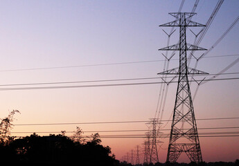 Fototapeta premium Electric poles and the sunset