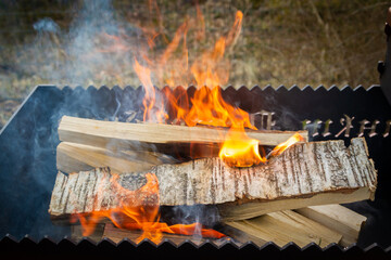 Dry wood in the grill for kindling and making coals - 488169872