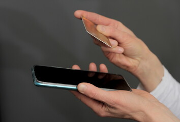 credit card purchasing using mobile phone stock photo 