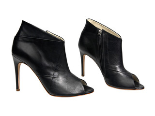 Pair of female black leather shoes isolated on white