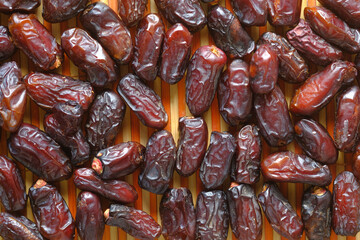 close up of fresh date fruits on table 