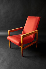 red chair on black background