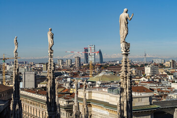Scenic view of Milan historic center and modern skyline from the spires of Milan Cathedral, Italy