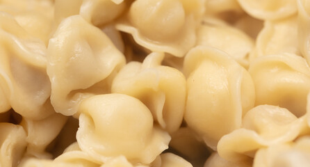 Boiled dumplings made from dough and meat.