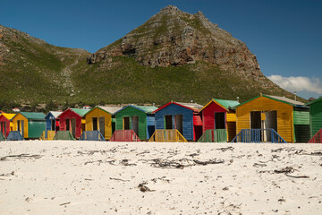 Muizenberg beach with colorful cabins in Cape Town, South Africa