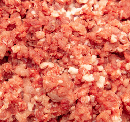 Minced meat and fat as background.