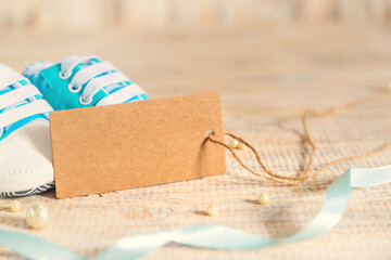 Baby booties accessories on a white background.