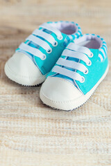 Baby booties accessories on a white background.