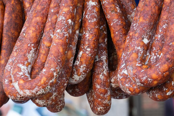 Sausage in a market consisting of red chorizo, a delicious typical snack Spanish