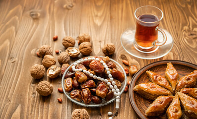 Dates, rosaries and baklava. Ramadan Selective focus