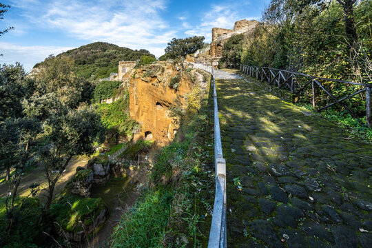 An ancient street leading to terrace of the Temple of Apollo at Cuma earchaeological site, Pozzuoli, Italy