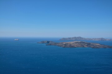 Breathtaking view of the volcano and the Aegean Sea in Santorini on a beautiful day
