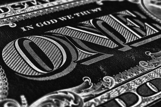 American paper money. 1 US dollar bill. Word one close-up. Dark inverted wallpaper. Black and white illustration. USA economy and business. Federal reserve note. Macro