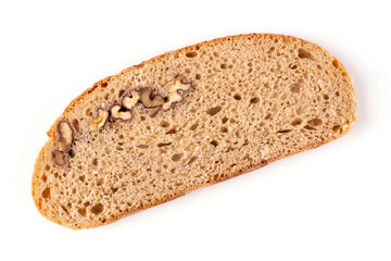 A piece (slice) of healthy round bread made of whole wheat flour with walnuts on a white isolated background. Proper nutrition. Sourdough bread, without yeast.