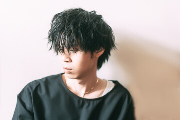 Portrait of young adult asian men in japanese look focus on hair style.