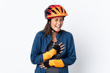 Young cyclist brazilian girl isolated on white  background smiling a lot
