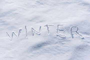 Winter word written in the snow