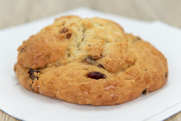 Cranberry and orange scone is baked to perfection and still warm from the oven and ready to eat