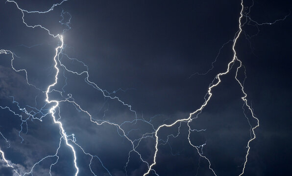 Thunder and lightning during summer storm at night.