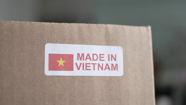Made in Vietnam Sticker on a Shipping Box With Products