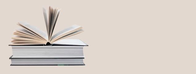 Banner with open and closed books. Education, learning information concept. Hardcover books stack with place for text. High quality photo