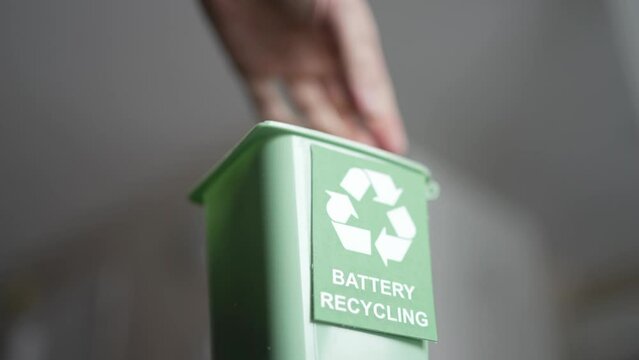 Recycling Batteries in a Bin Closeup on E Waste