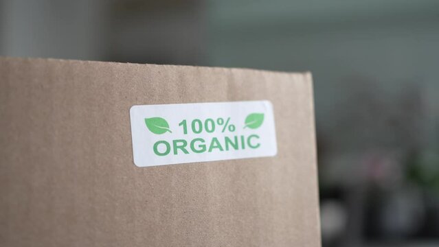 Organic Food Sticker on a Shipping Box With Products