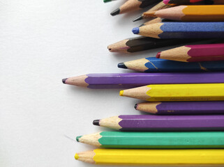 color pencils on a white background