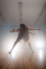 Group of multiracial dancers are exercising and practicing in their studio in slow motion
