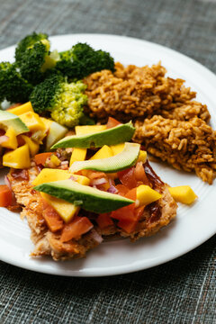 Spicy TVP Cutlets with Mango Salsa, Mexican Rice and Broccoli