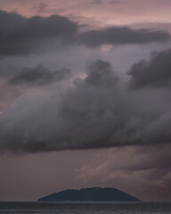 Stormy and cloudy evening at the coast of Ilhabela Sao Paulo Brazil.