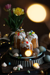 Light Easter. Easter cakes and eggs with flowers. cherry blossom, spring blooming