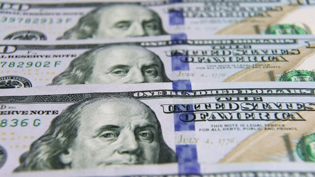 USD Dollar banknotes, paper money, exchange rate currency. Cash banknotes. The concept of finance and investment. hundred US dollars. business economics