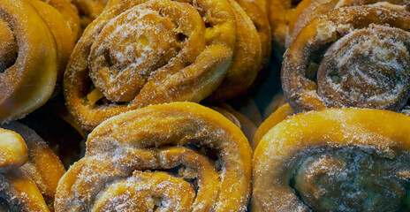 Delicious looking Apple Donuts (Apfelschnecken - Berliner) in a German patisserie