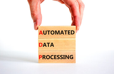 ADP automated data processing symbol. Concept words ADP automated data processing on blocks on a...