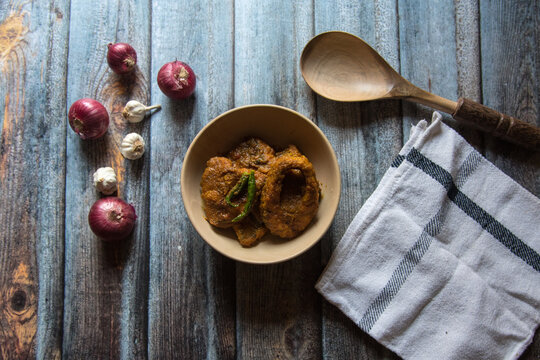Popular Bengali non vegetarian dish fish kalia or masala served in a bowl.