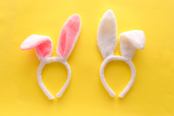 Happy Easter holiday concept, bunny ear on yellow background.