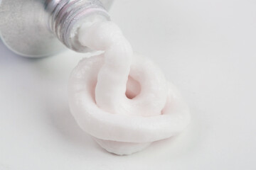 Close up image of ointment tube with squezzed product