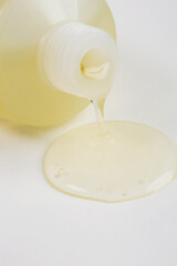 Close up image of cosmetic tube with squezzed gel	
