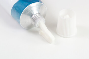 Close up image of ointment tube with squezzed product