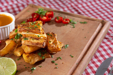 Fried cassava, a Brazilian cuisine food, latin snack. Yucca, yuca, manioca sticks