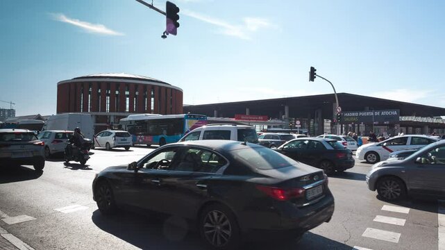 Time lapse in front of the Atocha train station in Madrid, Spain.