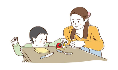 子供（息子）とおままごとをして遊ぶ母親
