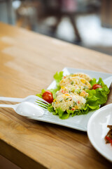 salad on a plate with a fork