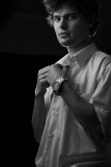Caucasian man portrait in white shirt in black and white